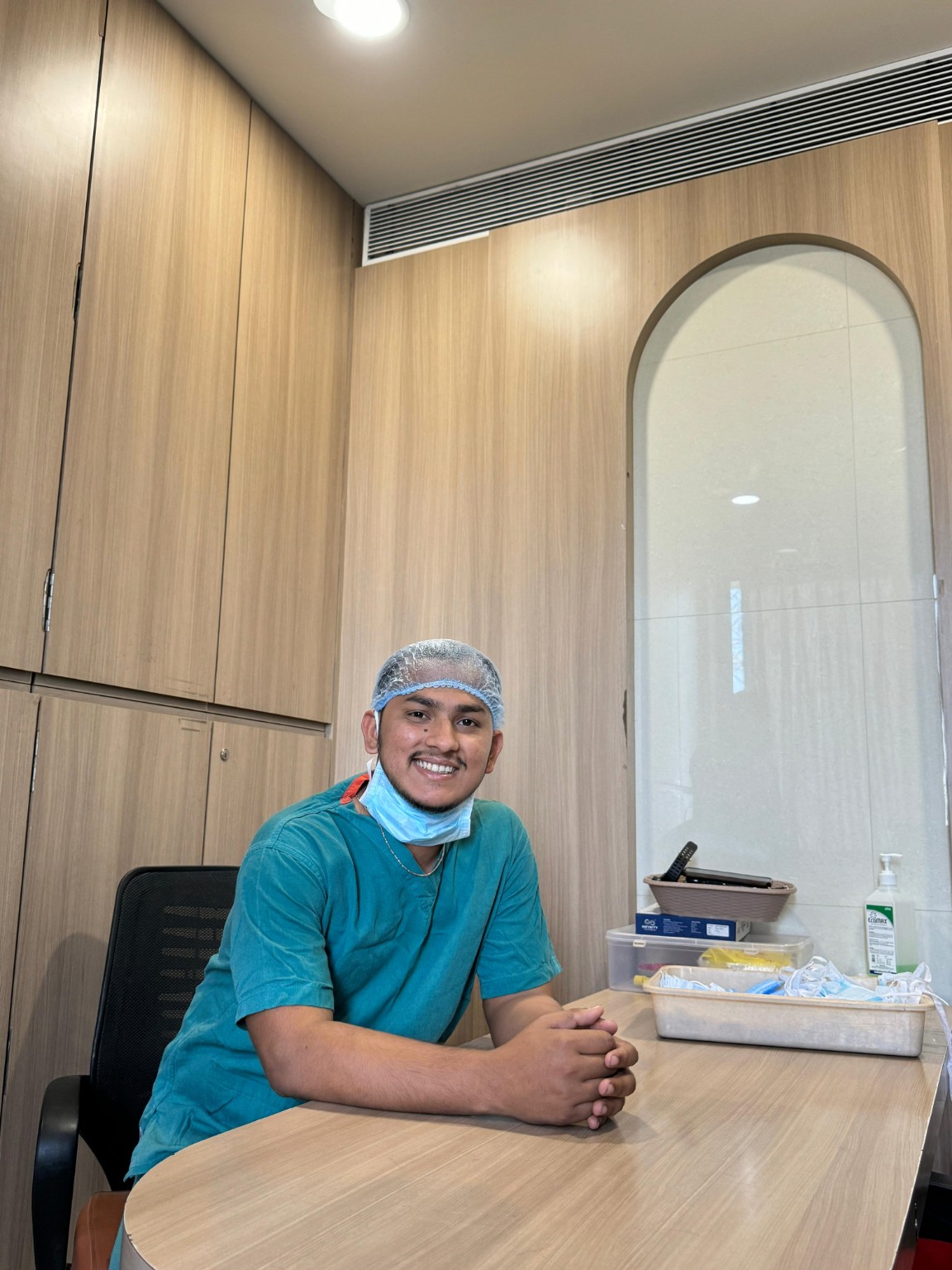 Dr. Shivam Chaudhary, PT in clinical scrubs